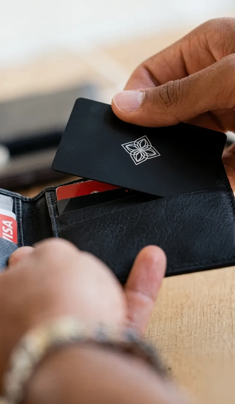 Sliding the Bloom Card out of a wallet