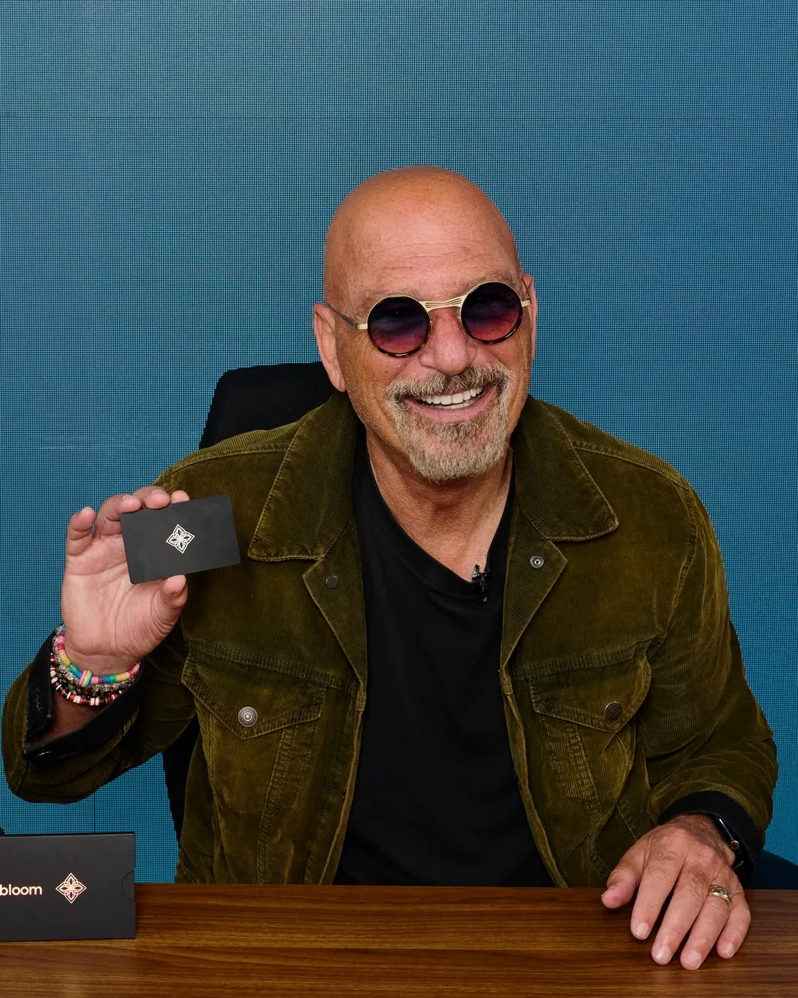 Howie Mandel holding the Bloom Card