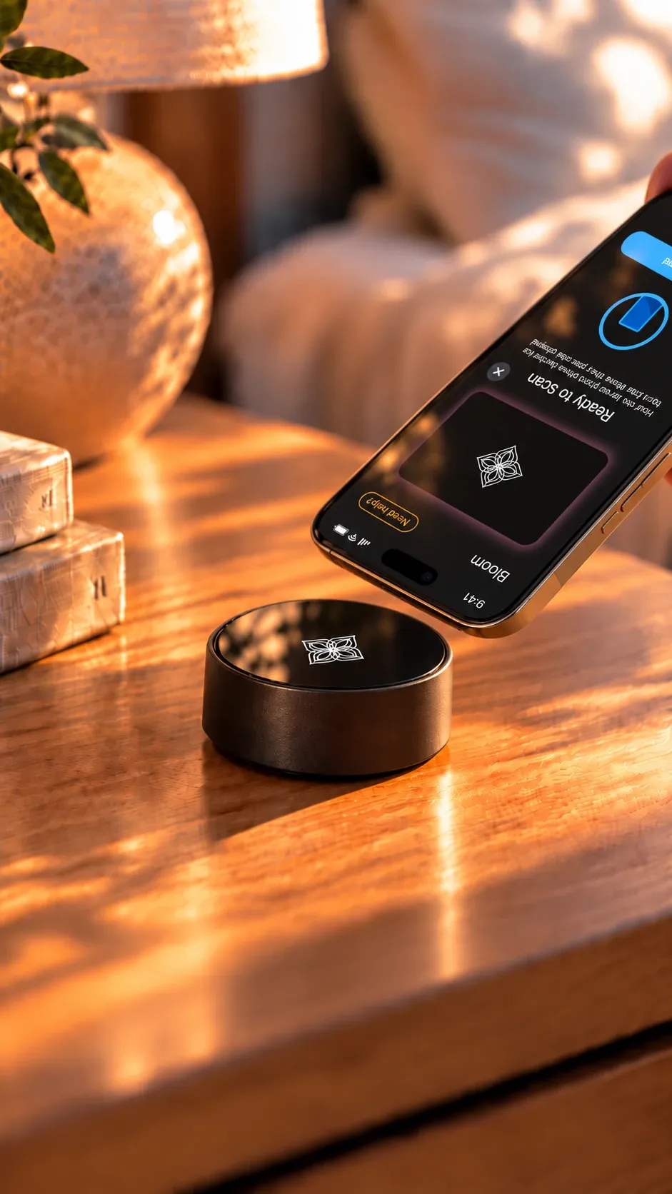 Tapping a phone on the Bloom Pod on a living room side table
